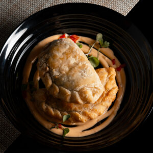 Beef & Roasted Chicken and Provolone Cheese Empanada